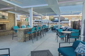 Outdoor Grill Area at The Met Apartment Homes, Hattiesburg, MS, 35402